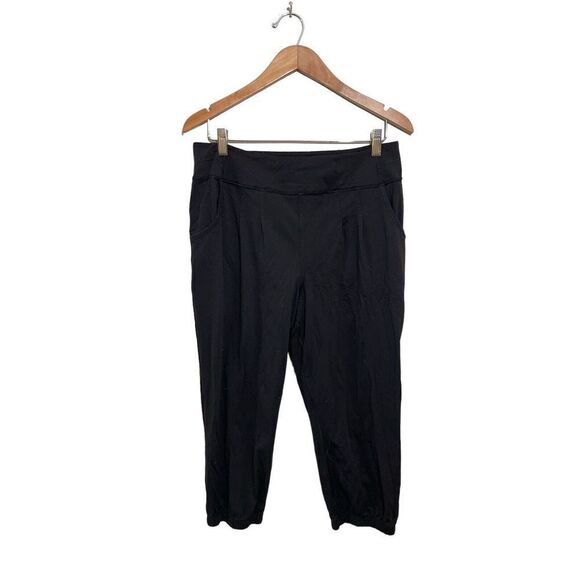 Lululemon Pleated Joggers Womens Size 8 Zip Pockets Cropped Stretch Knit Black‎ - Picture 1 of 6